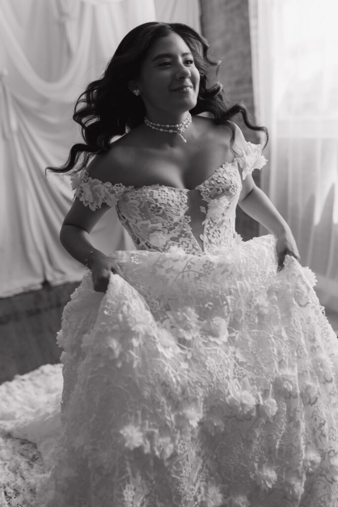 Dallas Texas wedding photographer captures bride Cindy’s lace gown in an airy studio.