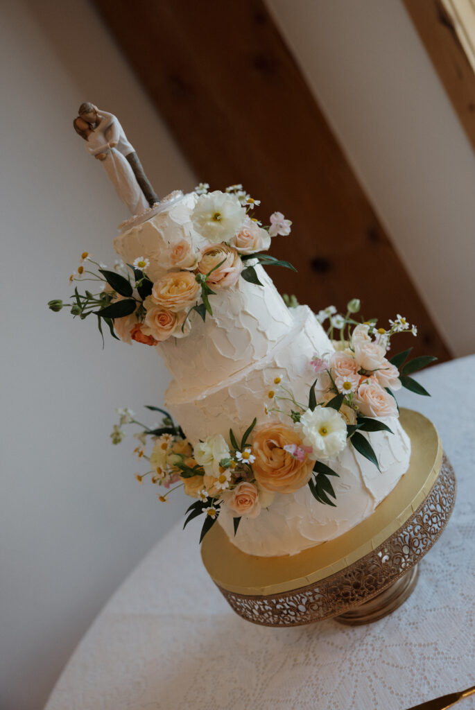Wedding cake covered in flowers in Austin Texas